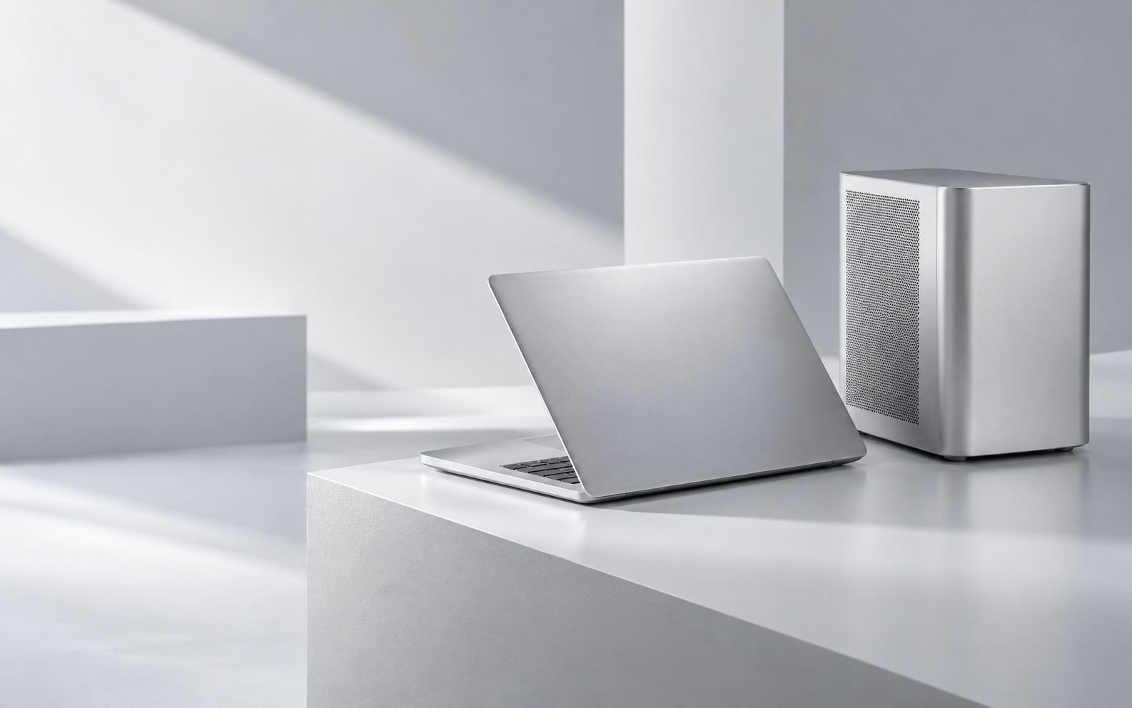 Certified used MacBook and desktop prepared in a clean studio